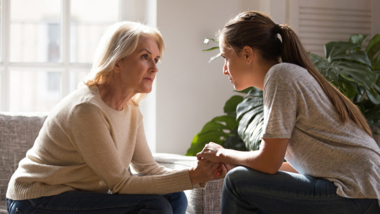 Two women having a conversation about addiction and recovery