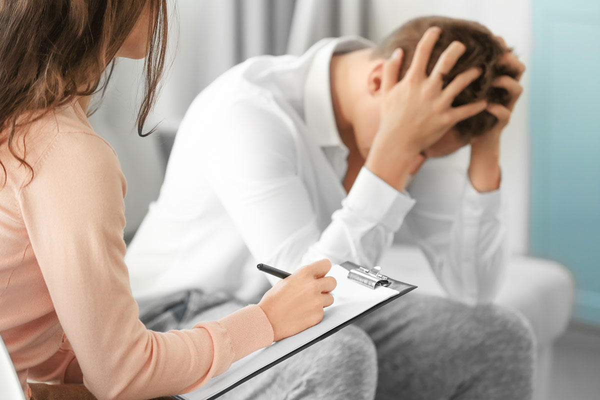 Doctor helping a patient recover from drug abuse