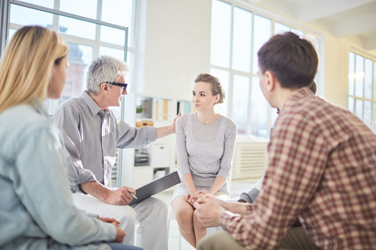 A support group session at Roots Recovery in Milwaukee, WI